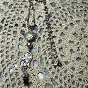 rhodochrosite, labradorite & glass bird & fish 
Pendant Necklace